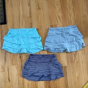 3 Athleta ruffle swagger skorts.  All Size M